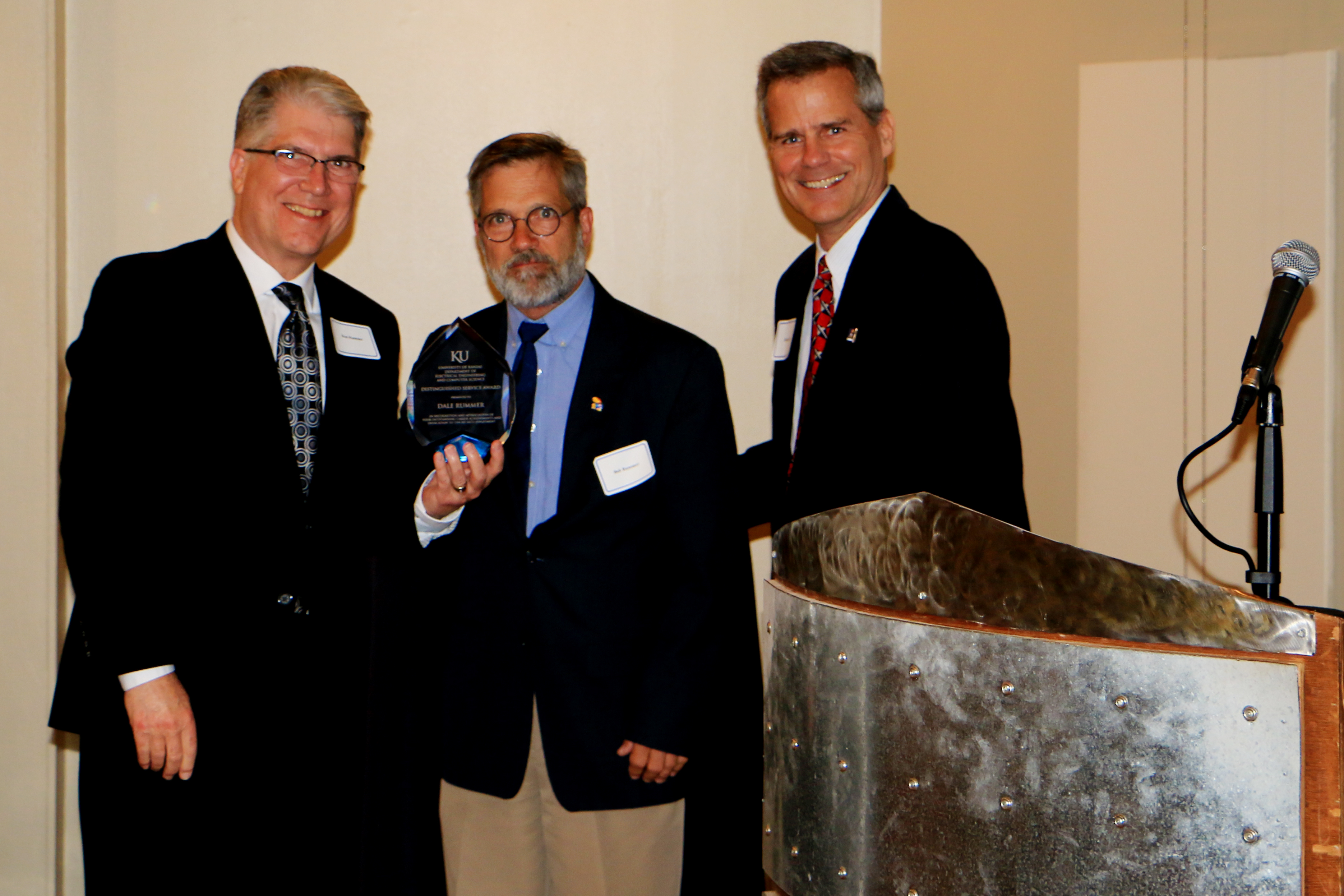 Mr. Ruf presenting the KEDS award to Ken and Bob Rummer